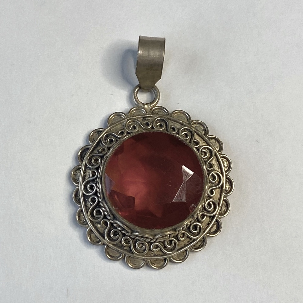 Silver pendent w/red stone